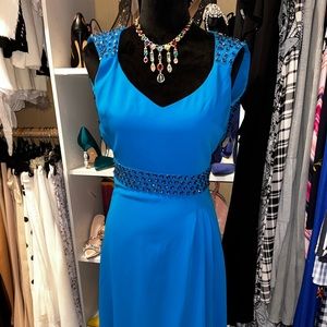 Blue dress with navy bead designs